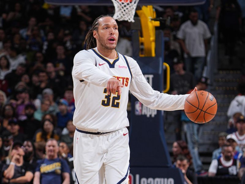 DENVER, CO - OCTOBER 13: Aaron Gordon #32 of the Denver Nuggets dribbles the ball during the game against the Phoenix Suns on October 13, 2024 at Ball Arena in Denver, Colorado. NOTE TO USER: User expressly acknowledges and agrees that, by downloading and/or using this Photograph, user is consenting to the terms and conditions of the Getty Images License Agreement. Mandatory Copyright Notice: Copyright 2024 NBAE (Photo by Garrett Ellwood/NBAE via Getty Images)