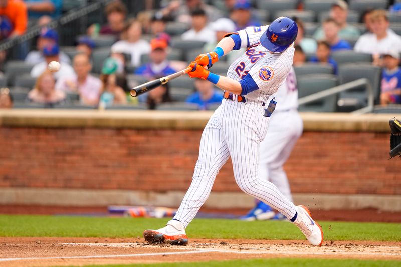 Jul 16, 2023; New York City, New York, USA; New York Mets third basaman Brett Baty (22) hits a single against the Los Angeles Dodgers during the second inning at Citi Field. Mandatory Credit: Gregory Fisher-USA TODAY Sports