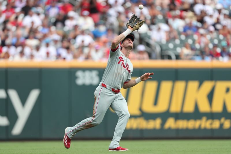 Jun 29, 2025; Cumberland, Georgia, Philadelphia Phillies left fielder Max Kepler (17) makes a catch for an out during a game against the Atlanta Braves during the fourth inning at Truist Park. Mandatory Credit: Mady Mertens-Imagn Images