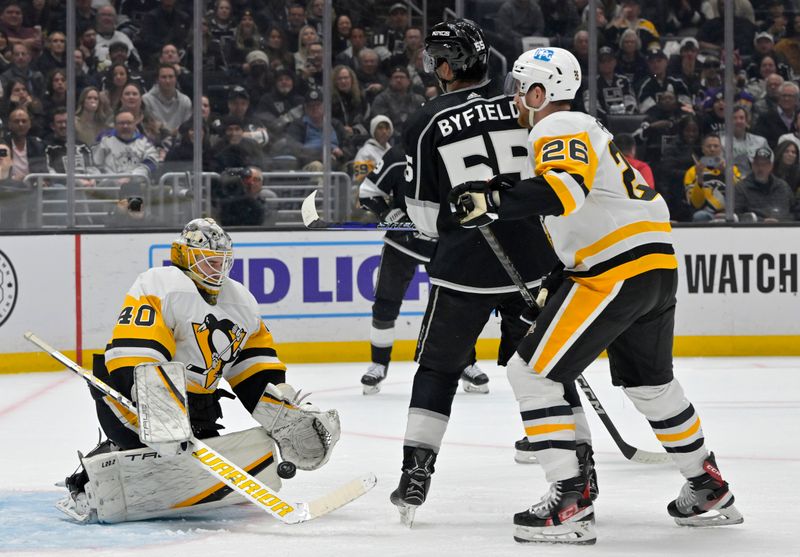 Feb 11, 2023; Los Angeles, California, USA;  Pittsburgh Penguins goaltender Dustin Tokarski (40) defends a shot by Los Angeles Kings center Quinton Byfield (55) in the second period at Crypto.com Arena. Mandatory Credit: Jayne Kamin-Oncea-USA TODAY Sports