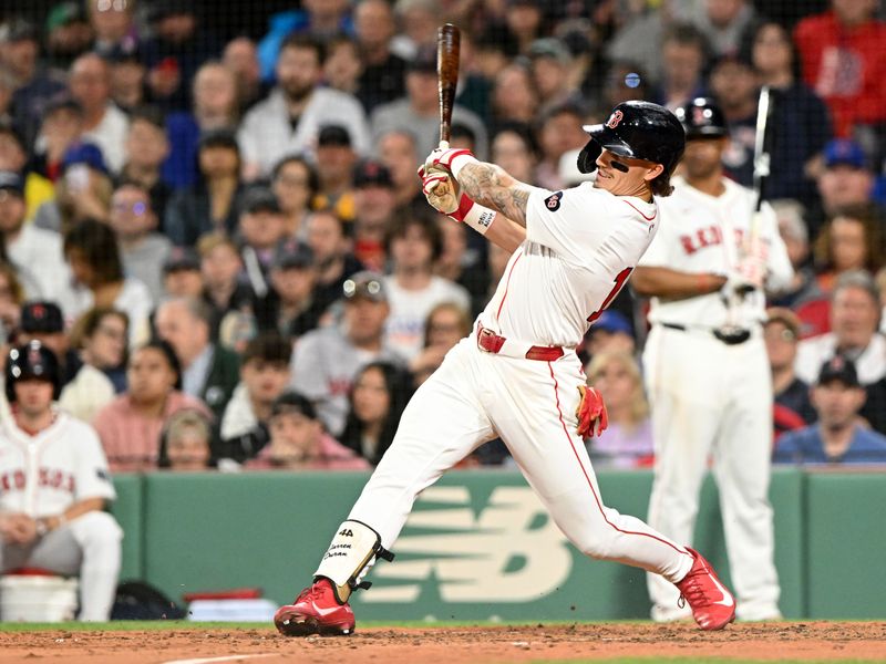 Apr 28, 2024; Boston, Massachusetts, USA; Boston Red Sox left fielder Jarren Duran (16) hits a two-run RBI triple against the Chicago Cubs during the sixth inning at Fenway Park. Mandatory Credit: Brian Fluharty-USA TODAY Sports