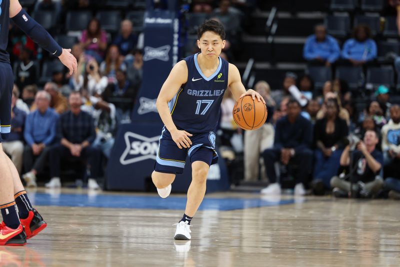 MEMPHIS, TENNESSEE - OCTOBER 31: Yuki Kawamura #17 of the Memphis Grizzlies dribbles the ball up the court against the Milwaukee Bucks during the fourth quarter at FedExForum on October 31, 2024 in Memphis, Tennessee. NOTE TO USER: User expressly acknowledges and agrees that, by downloading and or using this Photograph, user is consenting to the terms and conditions of the Getty Images License Agreement. (Photo by Wes Hale/Getty Images)