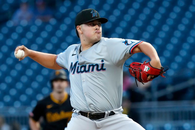 Sep 9, 2024; Pittsburgh, Pennsylvania, USA;  Miami Marlins starting pitcher Valente Bellozo (83) pitches against the Pittsburgh Pirates during the second inning at PNC Park. Mandatory Credit: Charles LeClaire-Imagn Images