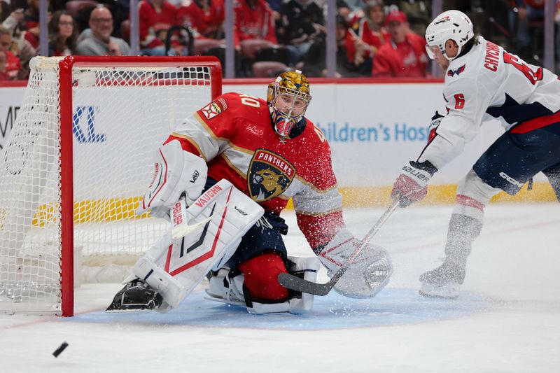 Nov 13, 2025; Sunrise, Florida, USA; Florida Panthers goaltender Daniil Tarasov (40) makes a save against Washington Capitals defenseman Jakob Chychrun (6) during the third period at Amerant Bank Arena. Mandatory Credit: Sam Navarro-Imagn Images