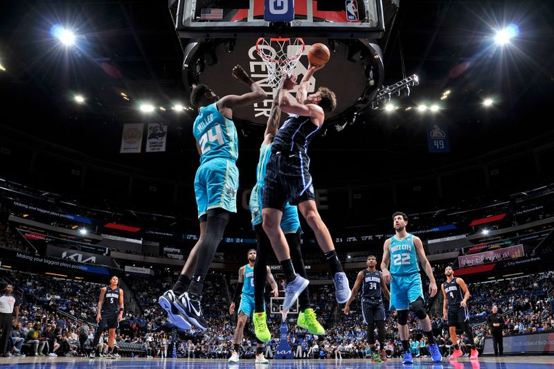 ORLANDO, FL - MARCH 19: Franz Wagner #22 of the Orlando Magic drives to the basket during the game against the Charlotte Hornets on March 19, 2024 at the Kia Center in Orlando, Florida. NOTE TO USER: User expressly acknowledges and agrees that, by downloading and or using this photograph, User is consenting to the terms and conditions of the Getty Images License Agreement. Mandatory Copyright Notice: Copyright 2024 NBAE (Photo by Fernando Medina/NBAE via Getty Images)