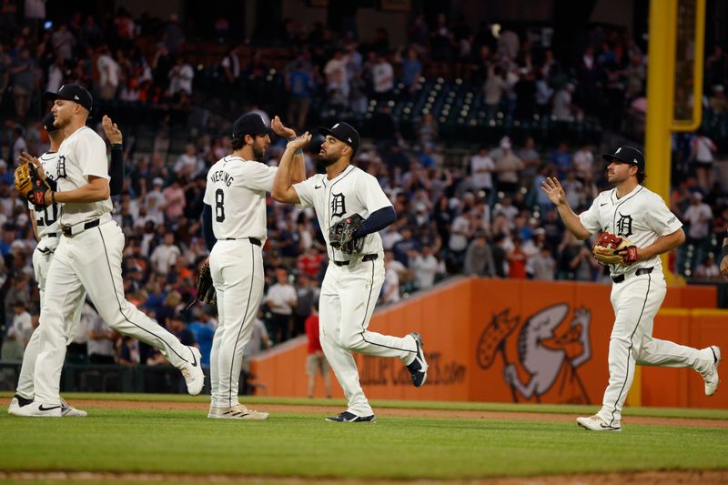 Apr 27, 2024; Detroit, Michigan, USA; The Detroit Tigers celebrate their win over the Kansas City Royals following the game at Comerica Park. Mandatory Credit: Brian Bradshaw Sevald-USA TODAY Sports