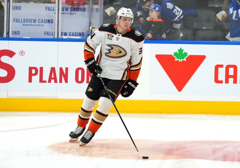 Feb 17, 2024; Toronto, Ontario, CAN; Anaheim Ducks defenseman Pavel Mintyukov (34) warms up before a game against the Toronto Maple Leafs at Scotiabank Arena. Mandatory Credit: Nick Turchiaro-USA TODAY Sports