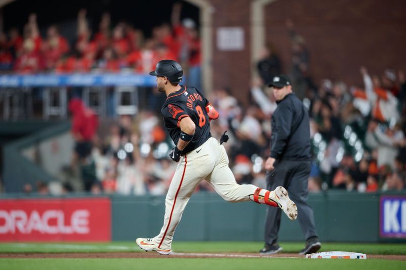 Aug 31, 2024; San Francisco, California, USA; San Francisco Giants outfielder Michael Conforto (8) runs the bases after hitting a one-run home run against the Miami Marlins during the eighth inning at Oracle Park. Mandatory Credit: Robert Edwards-USA TODAY Sports