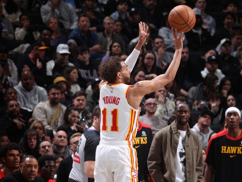 BROOKLYN, NY - MARCH 16: Trae Young #11 of the Atlanta Hawks shoots the ball during the game against the Brooklyn Nets on March 16, 2025 at Barclays Center in Brooklyn, New York. NOTE TO USER: User expressly acknowledges and agrees that, by downloading and or using this Photograph, user is consenting to the terms and conditions of the Getty Images License Agreement. Mandatory Copyright Notice: Copyright 2025 NBAE (Photo by Nathaniel S. Butler/NBAE via Getty Images)