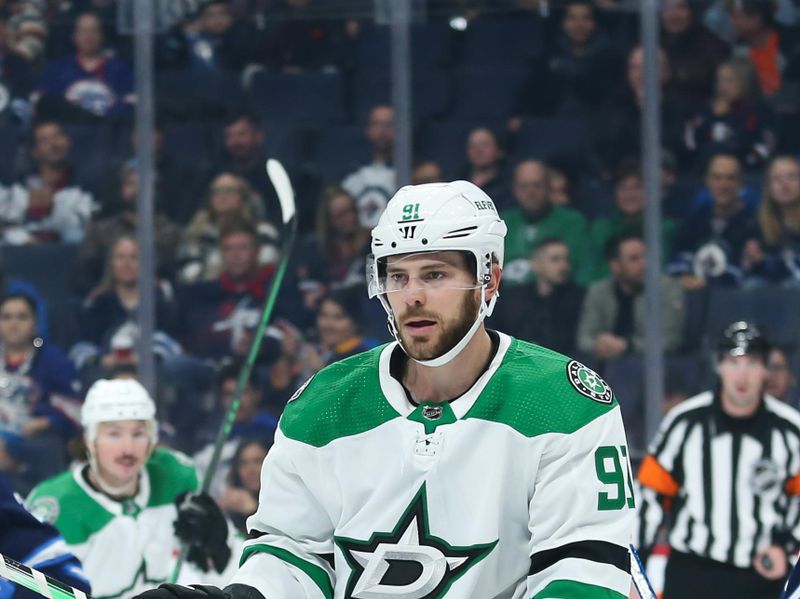 Nov 11, 2023; Winnipeg, Manitoba, CAN;  Dallas Stars forward Tyler Seguin (91) looks for the puck against the Winnipeg Jets during the first period at Canada Life Centre. Mandatory Credit: Terrence Lee-USA TODAY Sports