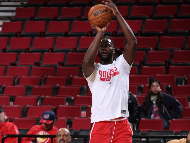 PORTLAND, OR - FEBRUARY 26: Usman Garuba #16 of the Houston Rockets warms up before the game against the Portland Trail Blazers on February 26, 2023 at the Moda Center Arena in Portland, Oregon. NOTE TO USER: User expressly acknowledges and agrees that, by downloading and or using this photograph, user is consenting to the terms and conditions of the Getty Images License Agreement. Mandatory Copyright Notice: Copyright 2023 NBAE (Photo by Cameron Browne/NBAE via Getty Images)