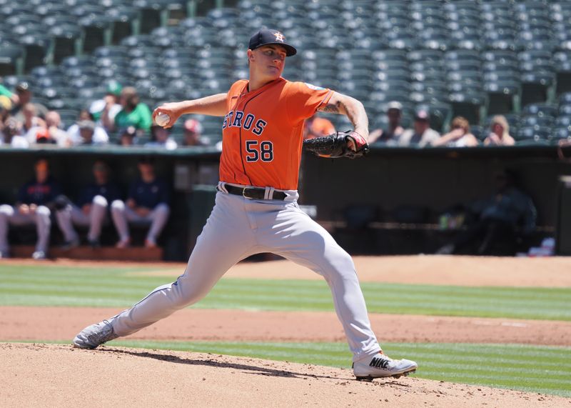 Jul 23, 2023; Oakland, California, USA; Houston Astros starting pitcher Hunter Brown (58) pitches the ball against the Oakland Athletics during the first inning at Oakland-Alameda County Coliseum. Mandatory Credit: Kelley L Cox-USA TODAY Sports