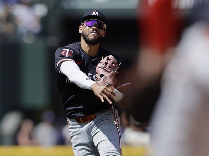 Jun 1, 2025; Seattle, Washington, USA; Minnesota Twins shortstop Carlos Correa (4) throws out Seattle Mariners designated hitter Jorge Polanco (7) during the eighth inning at T-Mobile Park. Mandatory Credit: John Froschauer-Imagn Images