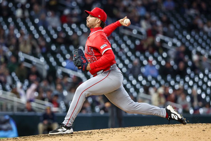 Apr 25, 2025; Minneapolis, Minnesota, USA; Los Angeles Angels relief pitcher Victor Mederos (58) delivers a pitch against the Minnesota Twins during the sixth inning at Target Field. Mandatory Credit: Matt Krohn-Imagn Images
