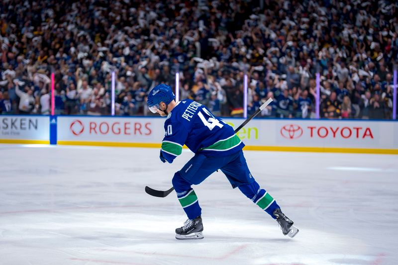 May 10, 2024; Vancouver, British Columbia, CAN; Vancouver Canucks forward Elias Pettersson (40) celebrates his goal against the Edmonton Oilers during the first period in game two of the second round of the 2024 Stanley Cup Playoffs at Rogers Arena. Mandatory Credit: Bob Frid-USA TODAY Sports