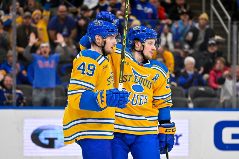 Jan 24, 2023; St. Louis, Missouri, USA;  St. Louis Blues center Ivan Barbashev (49) is congratulated by right wing Vladimir Tarasenko (91) after scoring against the Buffalo Sabres during the second period at Enterprise Center. Mandatory Credit: Jeff Curry-USA TODAY Sports