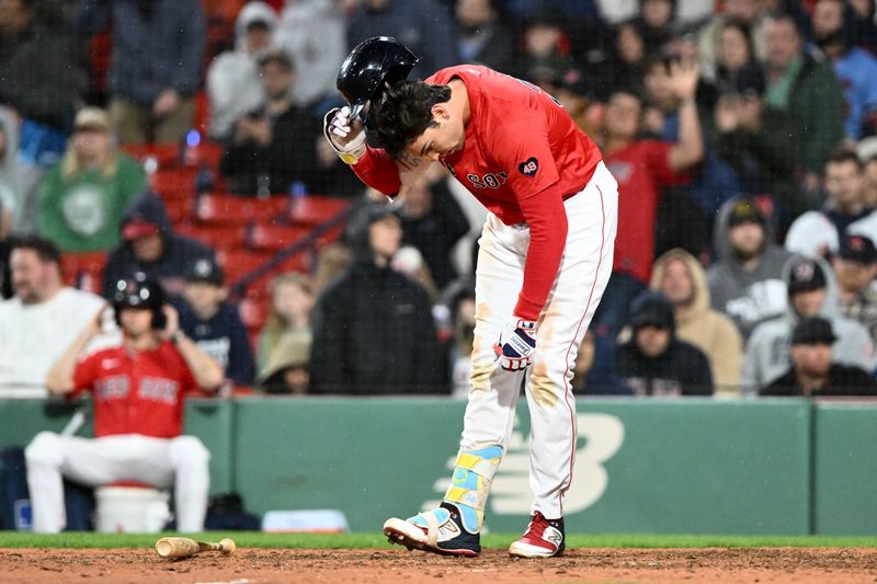 Sep 20, 2024; Boston, Massachusetts, USA; Boston Red Sox first baseman Triston Casas (36) reacts after striking out  during the 1th inning against the Minnesota Twins at Fenway Park. Mandatory Credit: Brian Fluharty-Imagn Images