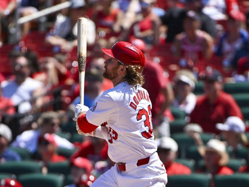 Jun 13, 2024; St. Louis, Missouri, USA;  St. Louis Cardinals left fielder Brendan Donovan (33) hits a solo home run against the Pittsburgh Pirates during the sixth inning at Busch Stadium. Mandatory Credit: Jeff Curry-USA TODAY Sports