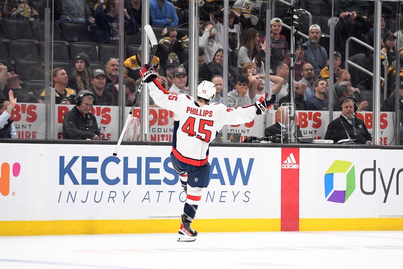 Oct 3, 2023; Boston, Massachusetts, USA; Washington Capitals forward Matthew Phillips (45) reacts after scoring an overtime goal against the Boston Bruins at TD Garden. Mandatory Credit: Bob DeChiara-USA TODAY Sports