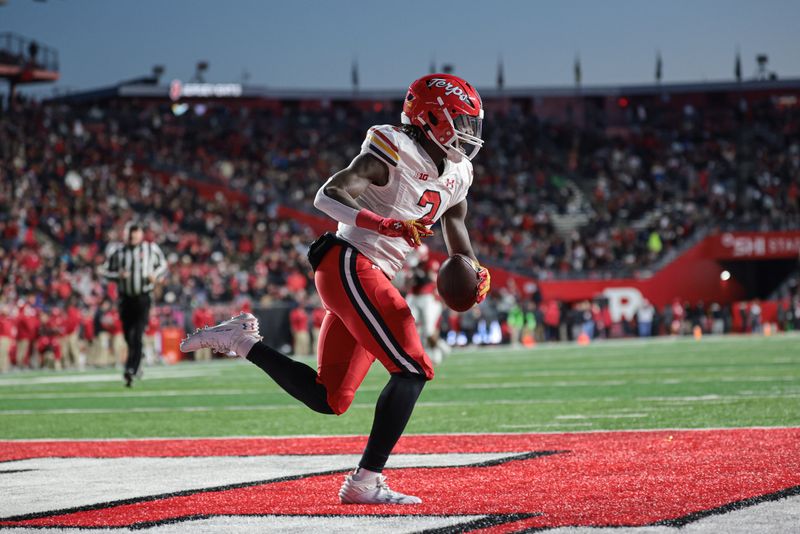 Nov 25, 2023; Piscataway, New Jersey, USA; Maryland Terrapins tight end Corey Dyches (2) celebrates his touchdown reception during the first half against the Rutgers Scarlet Knights at SHI Stadium. Mandatory Credit: Vincent Carchietta-USA TODAY Sports