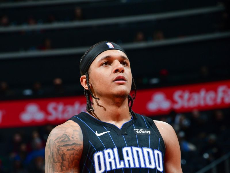 ATLANTA, GA - JANUARY 17: Paolo Banchero #5 of the Orlando Magic shoots a free throw during the game on January 17, 2024 at State Farm Arena in Atlanta, Georgia.  NOTE TO USER: User expressly acknowledges and agrees that, by downloading and/or using this Photograph, user is consenting to the terms and conditions of the Getty Images License Agreement. Mandatory Copyright Notice: Copyright 2024 NBAE (Photo by Scott Cunningham/NBAE via Getty Images)