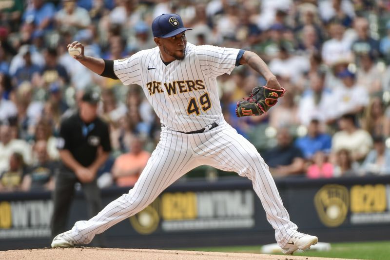 Jun 10, 2023; Milwaukee, Wisconsin, USA; Milwaukee Brewers pitcher Julio Teheran (49) pitches against the Oakland Athletes in the first inning at American Family Field. Mandatory Credit: Benny Sieu-USA TODAY Sports