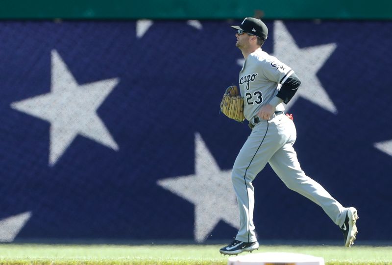 Apr 9, 2023; Pittsburgh, Pennsylvania, USA;  Chicago White Sox left fielder Andrew Benintendi (23) takes his position against the Pittsburgh Pirates during the seventh inning at PNC Park. The Pirates shutout Chicago 1-0. Mandatory Credit: Charles LeClaire-USA TODAY Sports