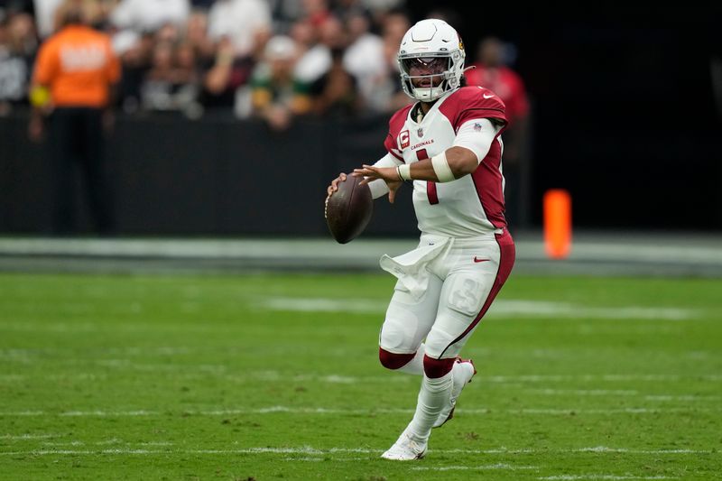 Arizona Cardinals quarterback Kyler Murray (1) throws against the Las Vegas Raiders during the first half of an NFL football game Sunday, Sept. 18, 2022, in Las Vegas. (AP Photo/John Locher)