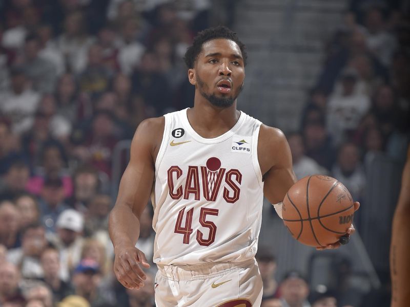 CLEVELAND, OH - APRIL 18: Donovan Mitchell #45 of the Cleveland Cavaliers dribbles the ball during Round One Game Two of the 2023 NBA Playoffs against the New York Knicks on April 18, 2023 at Rocket Mortgage FieldHouse in Cleveland, Ohio. NOTE TO USER: User expressly acknowledges and agrees that, by downloading and/or using this Photograph, user is consenting to the terms and conditions of the Getty Images License Agreement. Mandatory Copyright Notice: Copyright 2023 NBAE (Photo by David Liam Kyle/NBAE via Getty Images)