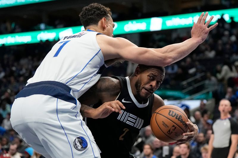 DALLAS, TEXAS - JANUARY 09: Xavier Tillman #2 of the Memphis Grizzlies controls the ball as Dwight Powell #7 of the Dallas Mavericks defends during the second half at American Airlines Center on January 09, 2024 in Dallas, Texas. NOTE TO USER: User expressly acknowledges and agrees that, by downloading and or using this photograph, User is consenting to the terms and conditions of the Getty Images License Agreement. (Photo by Sam Hodde/Getty Images)