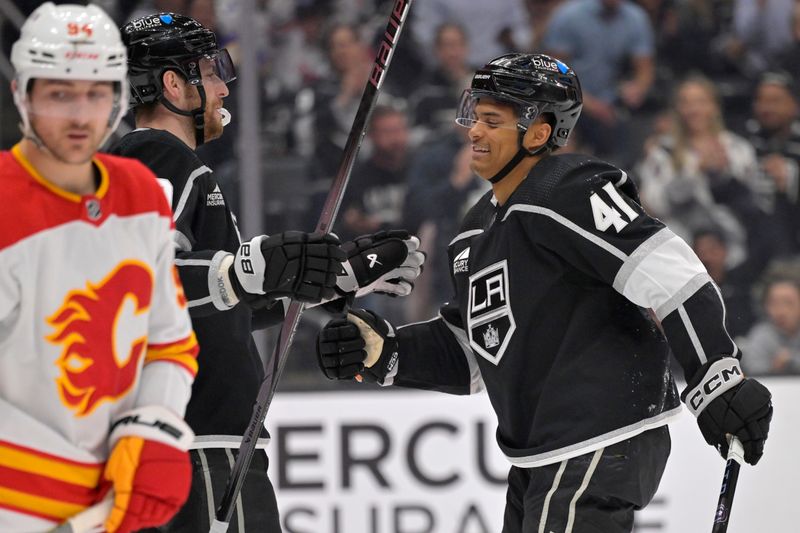 Apr 11, 2024; Los Angeles, California, USA; Los Angeles Kings center Akil Thomas (41) is congratulated by center Pierre-Luc Dubois (80) after scoring a goal in the second period against the Calgary Flames at Crypto.com Arena. Mandatory Credit: Jayne Kamin-Oncea-USA TODAY Sports