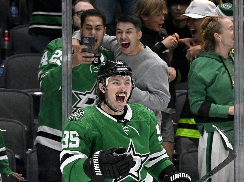 Nov 14, 2023; Dallas, Texas, USA; Dallas Stars center Matt Duchene (95) celebrates after he scores the game winning goal against the Arizona Coyotes during the overtime period at the American Airlines Center. Mandatory Credit: Jerome Miron-USA TODAY Sports