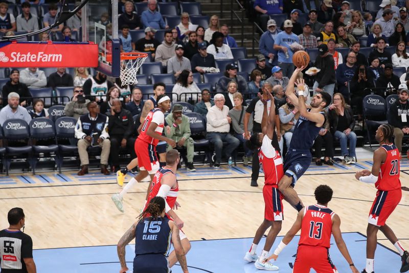 MEMPHIS, TN - NOVEMBER 8: Santi Aldama #7 of the Memphis Grizzlies shoots the ball during the game against the Washington Wizards on November 8, 2024 at FedExForum in Memphis, Tennessee. NOTE TO USER: User expressly acknowledges and agrees that, by downloading and or using this photograph, User is consenting to the terms and conditions of the Getty Images License Agreement. Mandatory Copyright Notice: Copyright 2024 NBAE (Photo by Joe Murphy/NBAE via Getty Images)