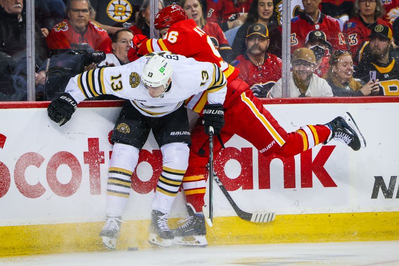 Feb 22, 2024; Calgary, Alberta, CAN; Boston Bruins center Charlie Coyle (13) and Calgary Flames left wing Andrei Kuzmenko (96) battles for the puck during the first period at Scotiabank Saddledome. Mandatory Credit: Sergei Belski-USA TODAY Sports