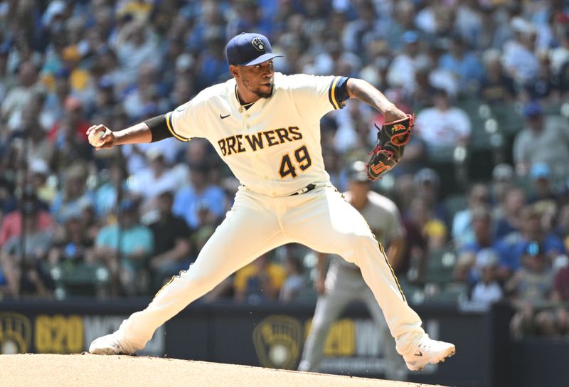 Jun 21, 2023; Milwaukee, Wisconsin, USA; Milwaukee Brewers starting pitcher Julio Teheran (49) delivers a pitch against the Arizona Diamondbacks in the first inning at American Family Field. Mandatory Credit: Michael McLoone-USA TODAY Sports