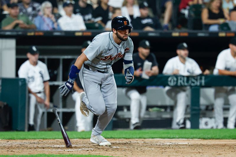 Aug 23, 2024; Chicago, Illinois, USA; Detroit Tigers outfielder Matt Vierling (8) runs after hitting an RBI-single against the Chicago White Sox during the seventh inning at Guaranteed Rate Field. Mandatory Credit: Kamil Krzaczynski-USA TODAY Sports