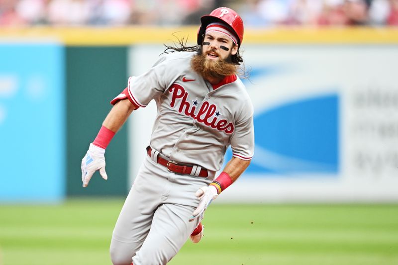 Jul 23, 2023; Cleveland, Ohio, USA; Philadelphia Phillies center fielder Brandon Marsh (16) rounds the bases en route to a triple during the fifth inning against the Cleveland Guardians at Progressive Field. Mandatory Credit: Ken Blaze-USA TODAY Sports