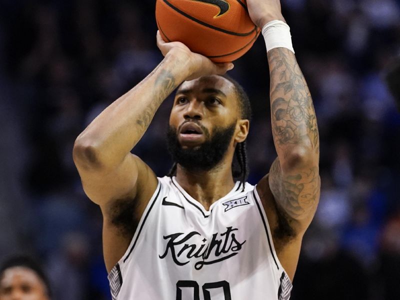 Feb 24, 2026; Provo, Utah, USA; UCF Knights forward Jordan Burks (99) takes a free throw during the second half against the BYU Cougars at Marriott Center. Mandatory Credit: Aaron Baker-Imagn Images 