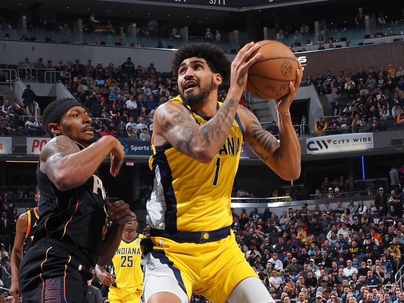 INDIANAPOLIS, IN - JANUARY 26: Obi Toppin #1 of the Indiana Pacers drives to the basket during the game against the Phoenix Suns on January 26, 2024 at Gainbridge Fieldhouse in Indianapolis, Indiana. NOTE TO USER: User expressly acknowledges and agrees that, by downloading and or using this Photograph, user is consenting to the terms and conditions of the Getty Images License Agreement. Mandatory Copyright Notice: Copyright 2024 NBAE (Photo by Ron Hoskins/NBAE via Getty Images)