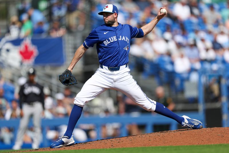 Mar 8, 2024; Dunedin, Florida, USA;  Toronto Blue Jays relief pitcher Tim Mayza (58) throws a pitch against the New York Yankees in the seventh inning at TD Ballpark. Mandatory Credit: Nathan Ray Seebeck-USA TODAY Sports