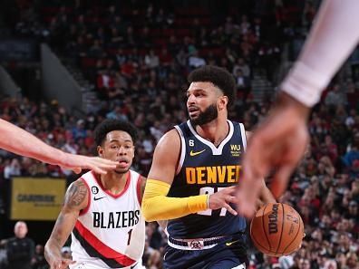 PORTLAND, OR - OCTOBER 24: Jamal Murray #27 of the Denver Nuggets drives to the basket during the game against the Portland Trail Blazers on October 24, 2022 at the Moda Center Arena in Portland, Oregon. NOTE TO USER: User expressly acknowledges and agrees that, by downloading and or using this photograph, user is consenting to the terms and conditions of the Getty Images License Agreement. Mandatory Copyright Notice: Copyright 2022 NBAE (Photo by Sam Forencich/NBAE via Getty Images)