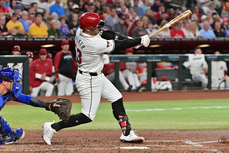 Apr 17, 2024; Phoenix, Arizona, USA;  Arizona Diamondbacks first base Christian Walker (53) hits into a double play in the third inning against the Chicago Cubs at Chase Field. Mandatory Credit: Matt Kartozian-USA TODAY Sports