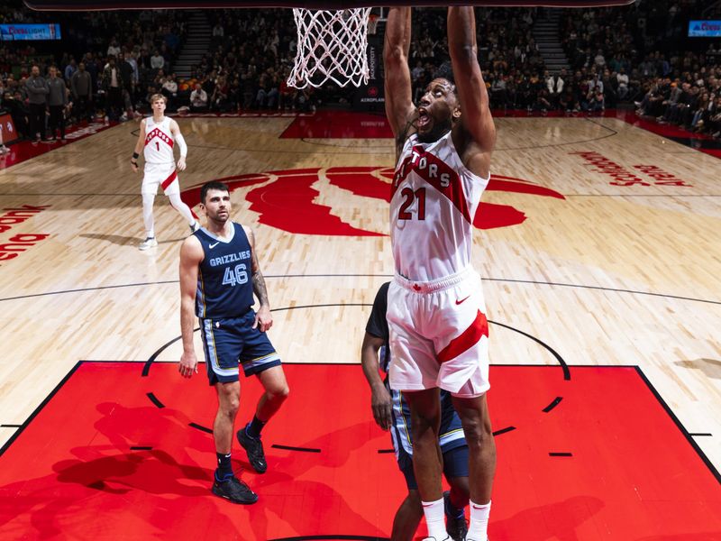 TORONTO, CANADA - JANUARY 22: Thaddeus Young #21 of the Toronto Raptors dunks the ball during the game against the Memphis Grizzlies on January 22, 2024 at the Scotiabank Arena in Toronto, Ontario, Canada.  NOTE TO USER: User expressly acknowledges and agrees that, by downloading and or using this Photograph, user is consenting to the terms and conditions of the Getty Images License Agreement.  Mandatory Copyright Notice: Copyright 2024 NBAE (Photo by Mark Blinch/NBAE via Getty Images)