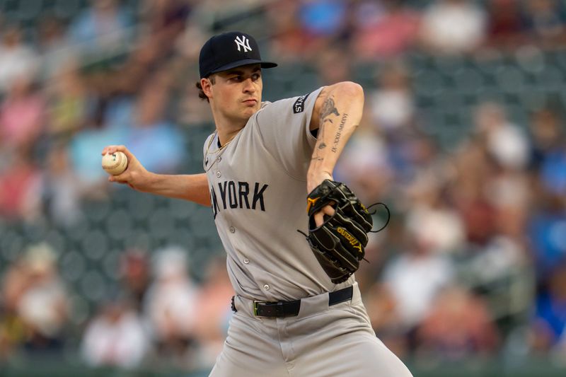 Sep 16, 2025; Minneapolis, Minnesota, USA; New York Yankees starting pitcher Cam Schlittler (31) delivers a pitch against the Minnesota Twins in the first inning at Target Field. Mandatory Credit: Jesse Johnson-Imagn Images