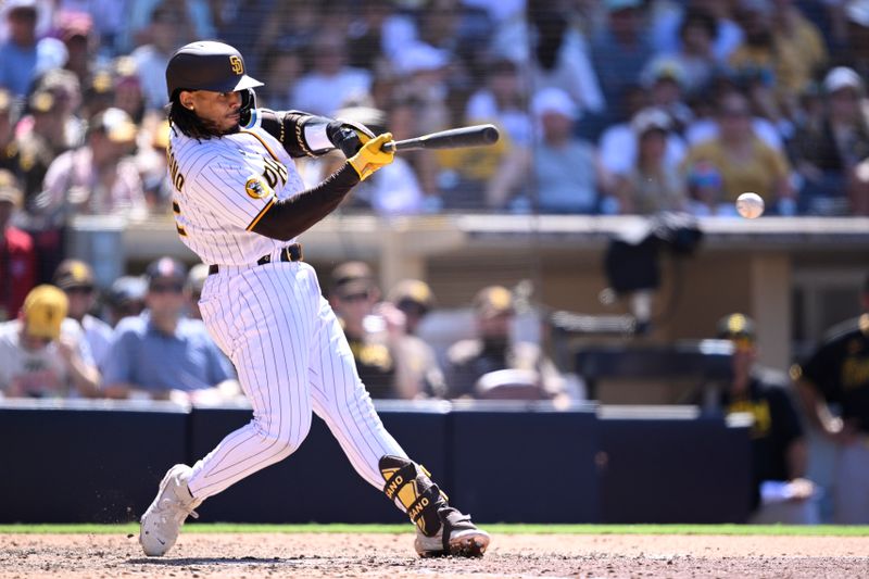 Jul 26, 2023; San Diego, California, USA; San Diego Padres catcher Luis Campusano (12) hits a single against the Pittsburgh Pirates during the ninth inning at Petco Park. Mandatory Credit: Orlando Ramirez-USA TODAY Sports