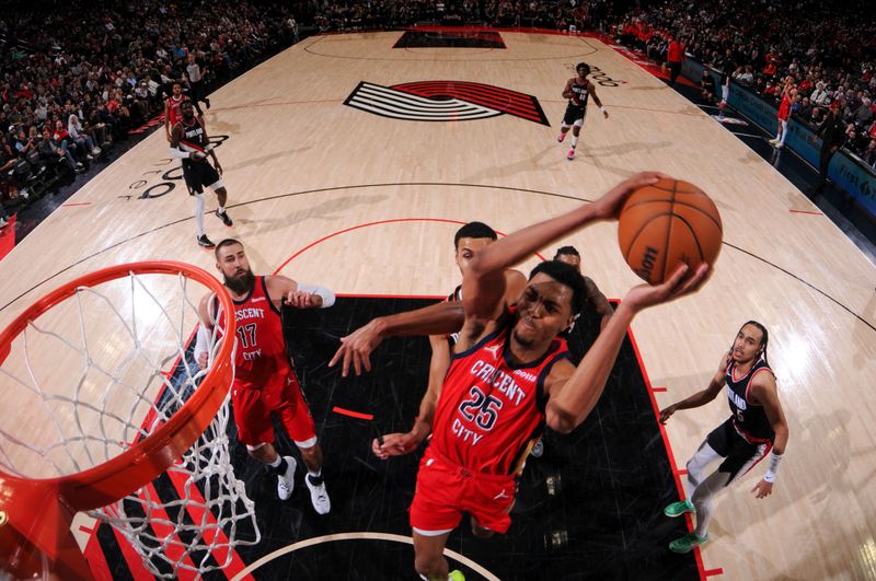 PORTLAND, OR - APRIL 9: Trey Murphy III #25 of the New Orleans Pelicans drives to the basket during the game against the Portland Trail Blazers on April 9, 2024 at the Moda Center Arena in Portland, Oregon. NOTE TO USER: User expressly acknowledges and agrees that, by downloading and or using this photograph, user is consenting to the terms and conditions of the Getty Images License Agreement. Mandatory Copyright Notice: Copyright 2024 NBAE (Photo by Cameron Browne/NBAE via Getty Images)