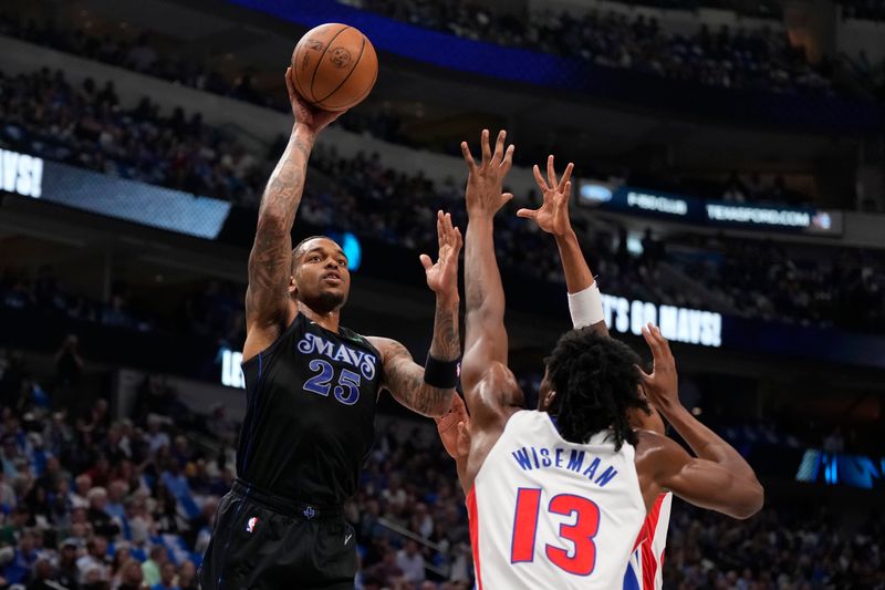 DALLAS, TEXAS - APRIL 12: P.J. Washington #25 of the Dallas Mavericks shoots over James Wiseman #13 of the Detroit Pistons during the first half at American Airlines Center on April 12, 2024 in Dallas, Texas. NOTE TO USER: User expressly acknowledges and agrees that, by downloading and or using this photograph, User is consenting to the terms and conditions of the Getty Images License Agreement. (Photo by Sam Hodde/Getty Images)