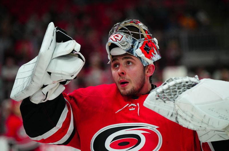 Dec 23, 2023; Raleigh, North Carolina, USA; Carolina Hurricanes goaltender Pyotr Kochetkov (52) looks on during the warmups before the game against the New York Islanders at PNC Arena. Mandatory Credit: James Guillory-USA TODAY Sports