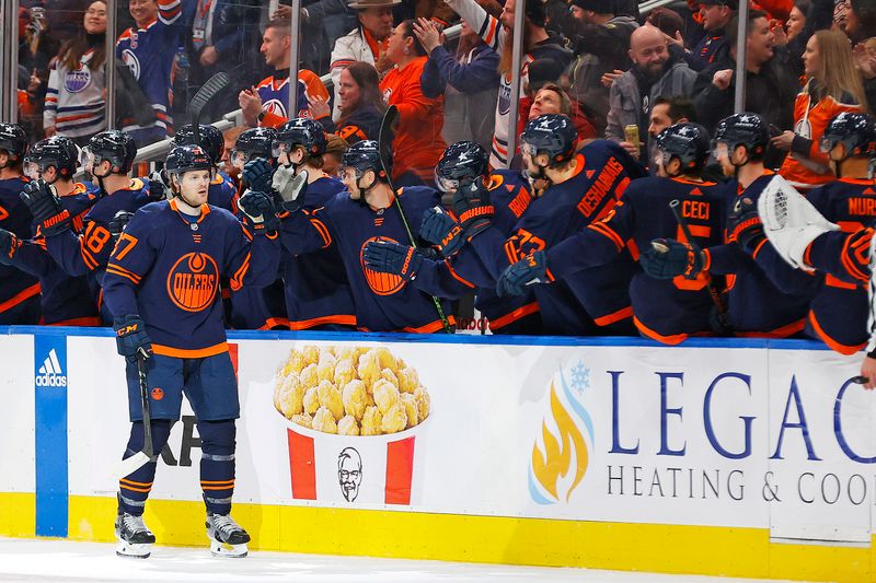 Jan 18, 2024; Edmonton, Alberta, CAN; The Edmonton Oilers celebrate a goal scored by forward Warren Foegele (37), his second of the game against the Seattle Kraken during the second period at Rogers Place. Mandatory Credit: Perry Nelson-USA TODAY Sports