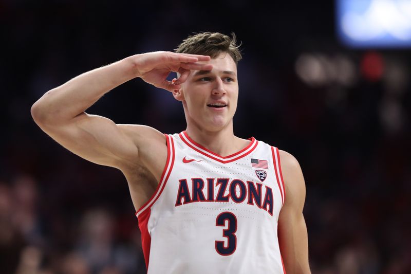 Feb 2, 2023; Tucson, Arizona, USA; Arizona Wildcats guard Pelle Larsson (3) salutes the crowd after a three pointer in the first hall at McKale Center. Mandatory Credit: Zachary BonDurant-USA TODAY Sports